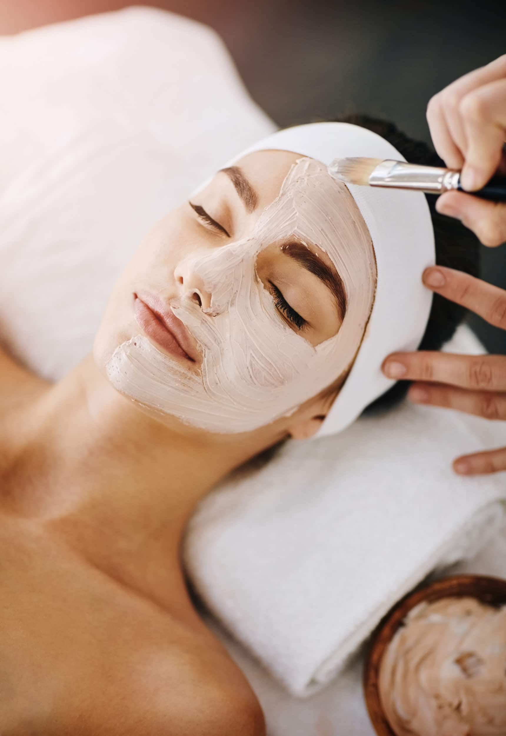 Shot of an attractive young woman getting a chemical peel at a beauty spa